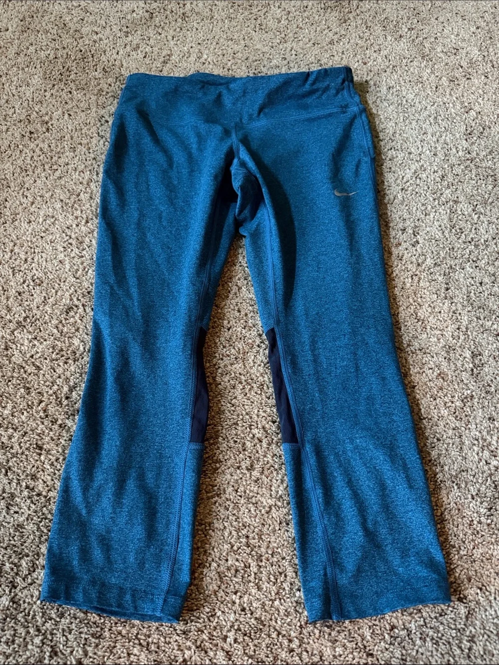 Nike Teal women’s cropped leggings